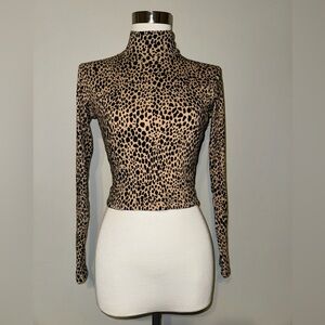 Brandy Melville one size (I would say small/medium) printed mock neck crop.